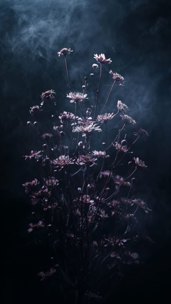 Moody arrangement of dark flowers