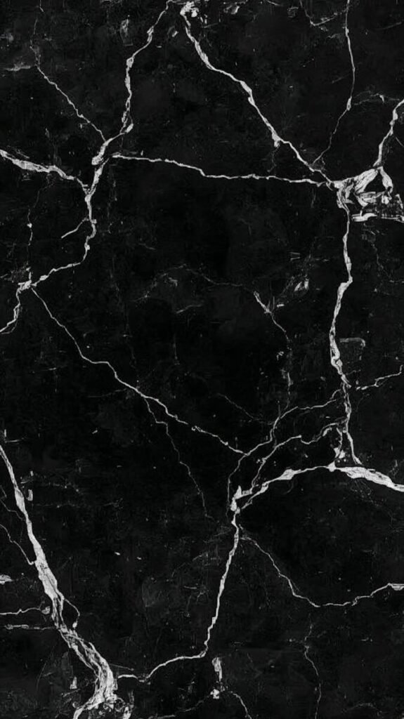 Black Marble Background with Intricate Gothic Symbols Wallpaper