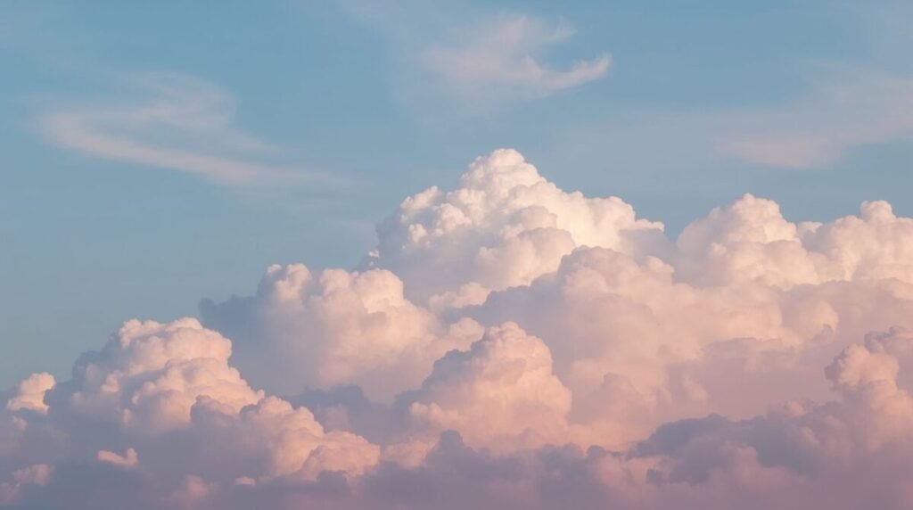 Golden hour sky with soft pastel clouds