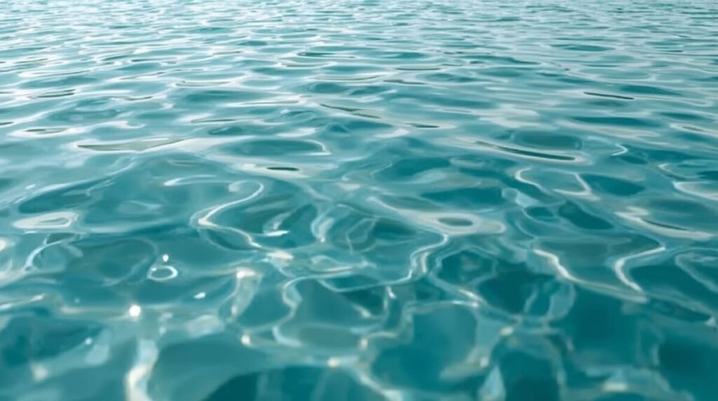 Serene Teal Water Ripple Texture Wallpaper